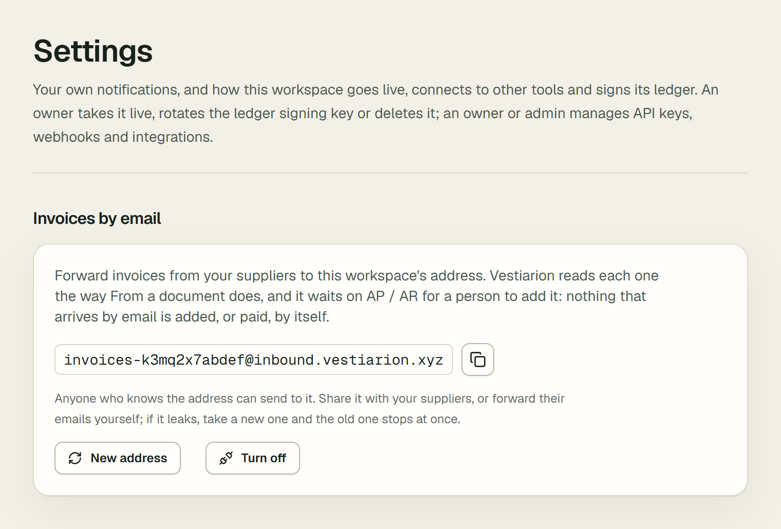 The Invoices by email section of Settings, turned on: the workspace's address, invoices- followed by a code at the inbound domain, with a Copy the address button; a note that anyone who knows the address can send to it and that a leaked address can be replaced; and the New address and Turn off buttons.